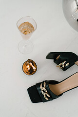 Elegant Black Sandals With Candle And Champagne