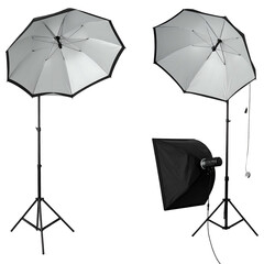 Studio photography equipment setup with two umbrella lights and one softbox