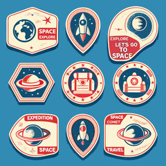 Collection of colorful space exploration patches depicting planets rockets and satellites © Ankan