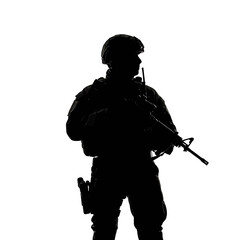 Silhouette of a soldier standing with a rifle and communication device