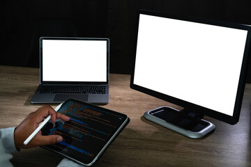 work from home office workspace with mock-up laptop with white blank screen working on laptop computer at home office