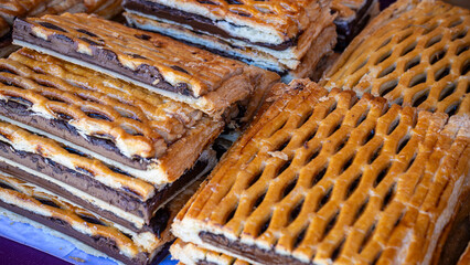 Layers of pastry with chocolate filling visible.