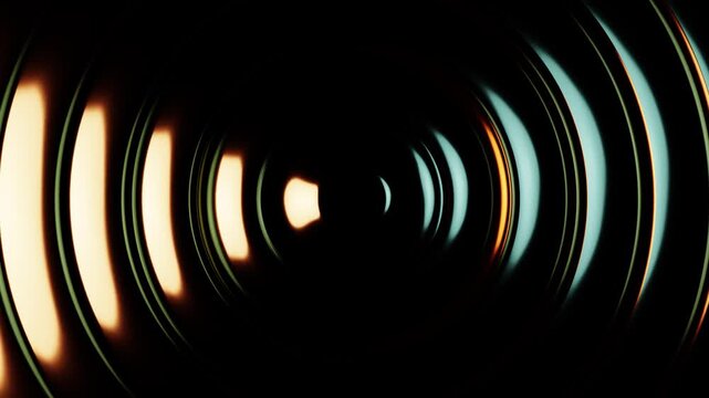 Glossy concentric metallic circles with light reflection and shadow. Endless loop.