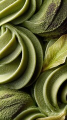 Close-Up of Matcha Green Tea Ice Cream Texture.Macro photography of swirled matcha green tea ice cream or soft serve with creamy texture, smooth spirals, and natural green leaf decoration.