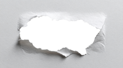 Torn piece of white paper creating a jagged hole and rough ripped edges, revealing a transparent background for creative content placement and design elements