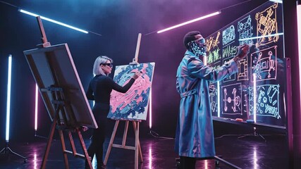Two creatives collaborating on a futuristic digital art project in a modern studio with neon lighting