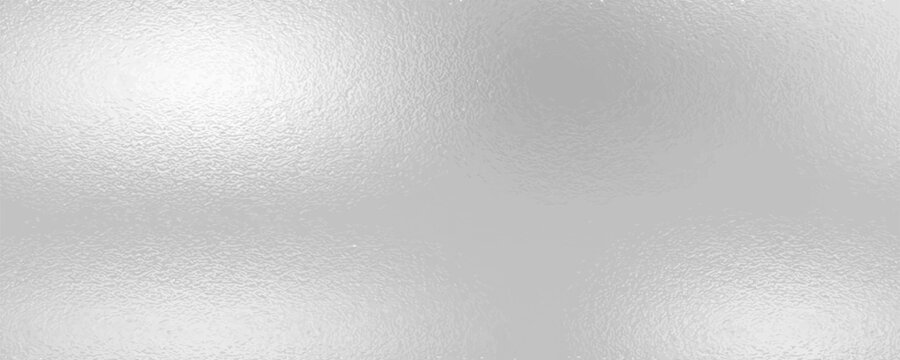 Silver foil background, gray platinum metallic texture. Silver gradient background. Foil paper, glitter effect. Chrome metal gray pattern. Gradation noise texture
