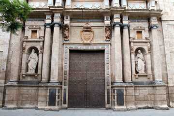 Obraz premium Entrance gate of the Virgen del Carmen church in Valencia,. July 2024.