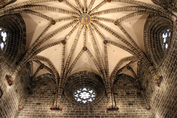 Chapel dome inside Valencia Cathedral with a beautiful altar and stone wall, taken in July 2024. © leodaphne