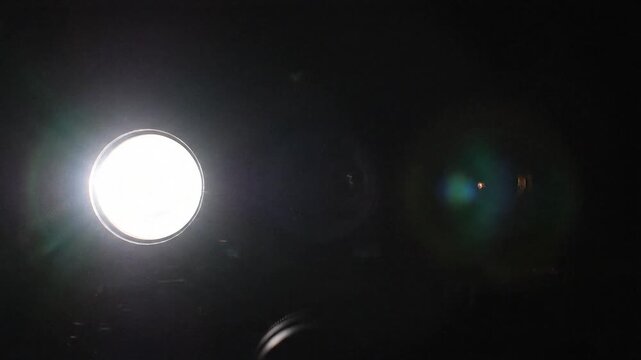 A dark image with minimal features and low visibility.