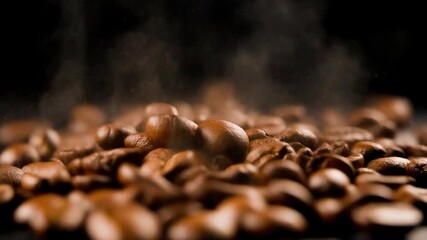 Roasted coffee beans falling in slow motion onto a matte black surface with subtle dust particles, cinematic 4K macro.