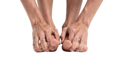 A closeup of hands touching toes while stretching on a plain white background illustrating quick movement exercises for mental reset.