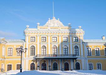 The central part of the facade of the ancient imperial Travel Palace on a sunny January day. Tver, Russia