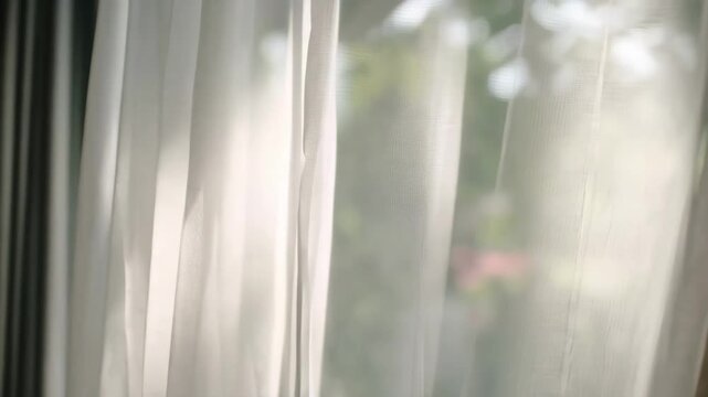 Close medium shot footage of installing solar control smart glass on a residential window emphasizing dynamic light filtering and UV protection for comfort.