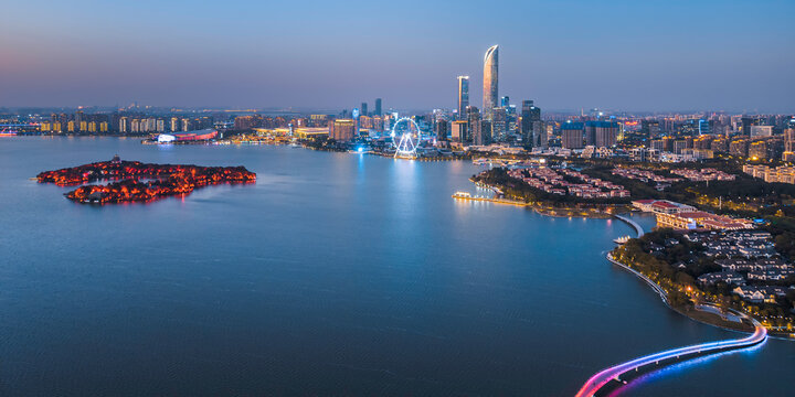 Night view of the skyline of Jinji Lake and Jinshuiwan Pier in Suzhou, Jiangsu, China