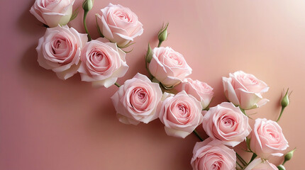 Obraz premium A vertical delicate bouquet of pink roses runs along a soft pink backdrop, creating a romantic valentine mood perfect for greeting cards, romance themes and love celebration visuals