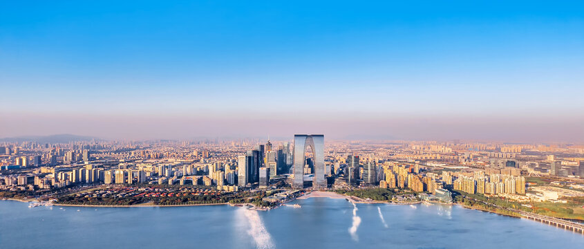 Aerial view of the skyline of Jinji Lake and The Gate of the Orient in Suzhou, Jiangsu Province, China.