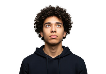Obraz premium Young man with curly dark hair gazes upward in thoughtful portrait transparent background