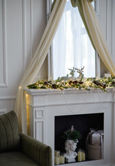 The fireplace in the bright room is decorated for the New Year.