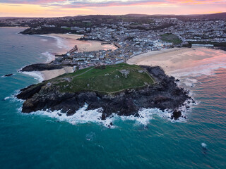 Vibrant twilight elevated capture of St Ives town, bay and beaches in Cornwall, UK