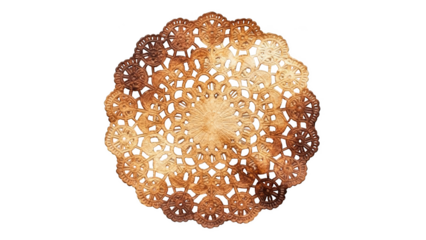 Ornate golden paper doily with intricate circular patterns on black background image