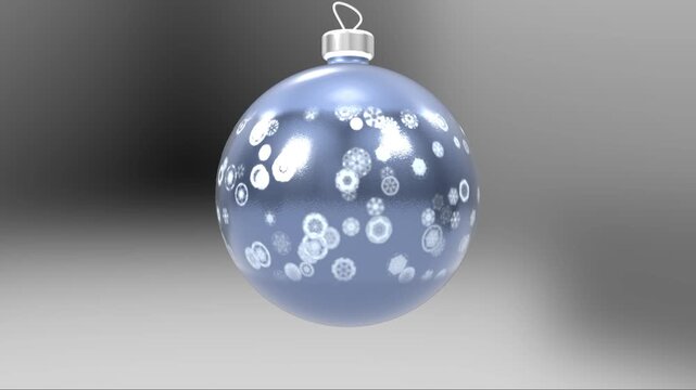 Elegant blue Christmas bauble ornament with white snowflake patterns and Cyrillic text rotating against a soft gray background