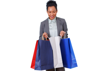 Happy black woman holding various shopping bags after a successful retail therapy session, transparent background