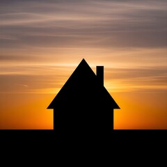 Silhouette of house at sunset