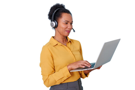 Woman wearing a headset and typing on a laptop, representing remote work, technical support, or online learning, transparent background