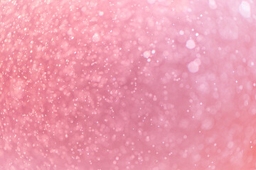 Soft pink glitter bokeh with dreamy light particles and smooth pastel glow. Airy background...