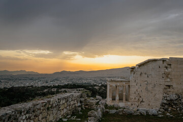 Sunset over the city of Athens, as seen from an old temple ruin on Acropolis Hill