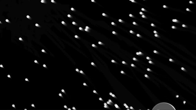 Abstract monochrome animation of glowing white particles streaming across a dark background like comets in deep space