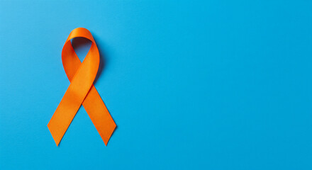 World Multiple Sclerosis Day. Horizontal banner. Copy space. Orange ribbon on a background for leukemia, kidney cancer, multiple sclerosis RSD awareness