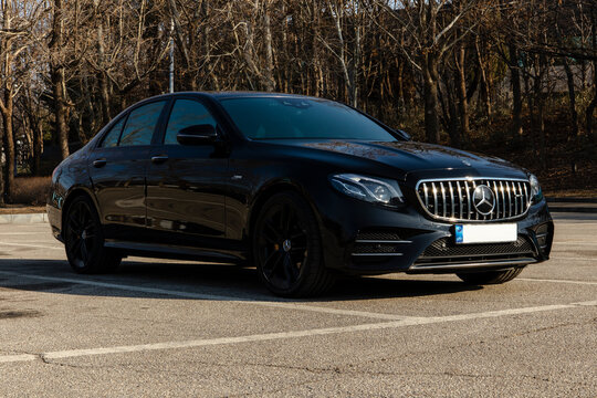 February 7, 2021, Seoul, South Korea - A black Mercedes-AMG E 53 sedan parked in an outdoor parking lot.