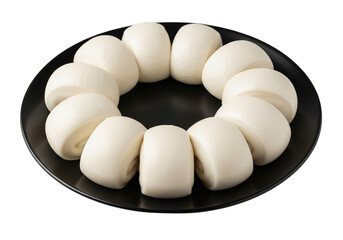 Steamed Chinese Mantou Buns on Black Plate Isolated