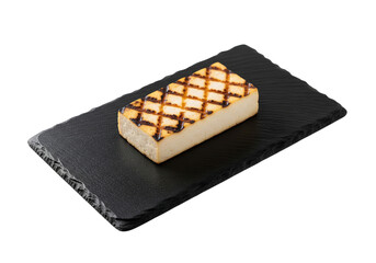 Grilled Halloumi Cheese on a Dark Stone Plate