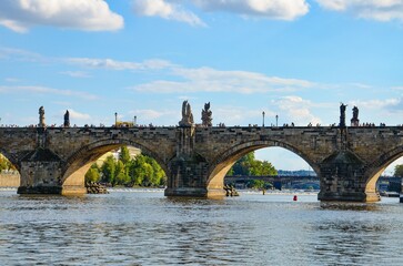 Czech Republic, Prague September 6, 2025, The Charles Bridge in Prague is undoubtedly one of the most popular bridges in Europe, and behind it, Prague Castle, towering over the Vltava River