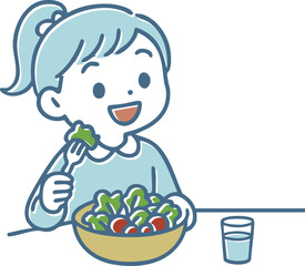 サラダを食べている笑顔の女の子