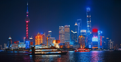Colorful Shanghai Skyline Reflection in Water During a Bright Night