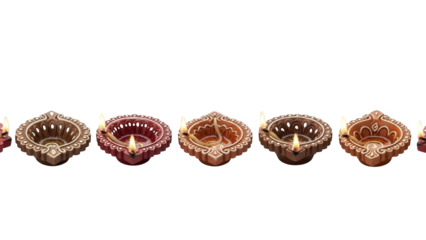 Diwali Decorative Clay Diya Lamps with Lit Candles in Various Colors and Designs on Black Background