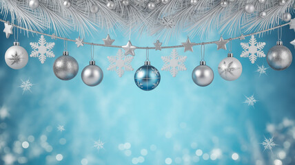 Silver and blue Christmas ornaments and snowflakes hanging on a festive garland against a blue background