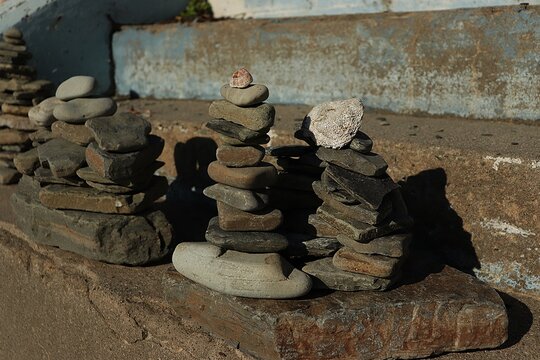 Zen Stone Stacks: Balancing Rocks in Sunlight