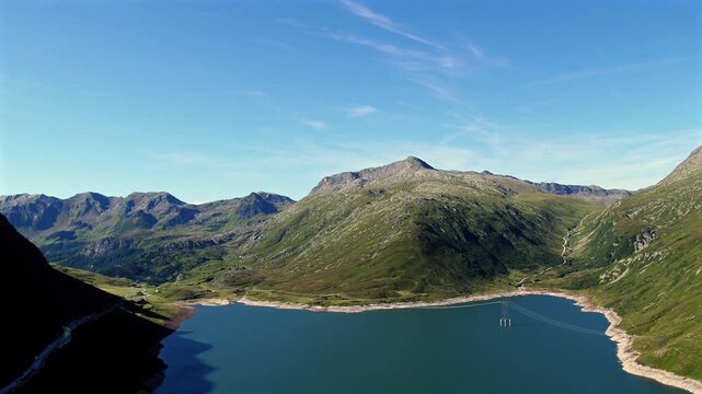 Aerial summer view of the Lukmanier Pass with the reservoir and clear blue sky