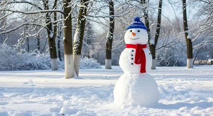 Obraz premium Snowman in winter landscape with trees.