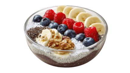 Healthy breakfast bowl of fresh muesli and yogurt topped with delicious red strawberries, blueberries, and raspberries for a sweet and nutritious morning meal