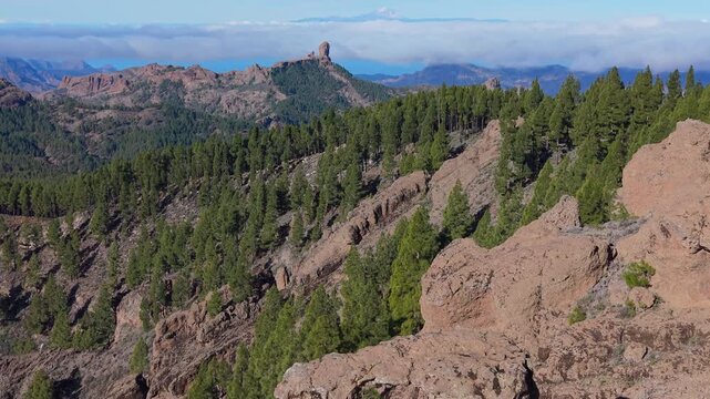 Discovering Roque Nublo and the snow-capped Teide volcano from the Nublo window.