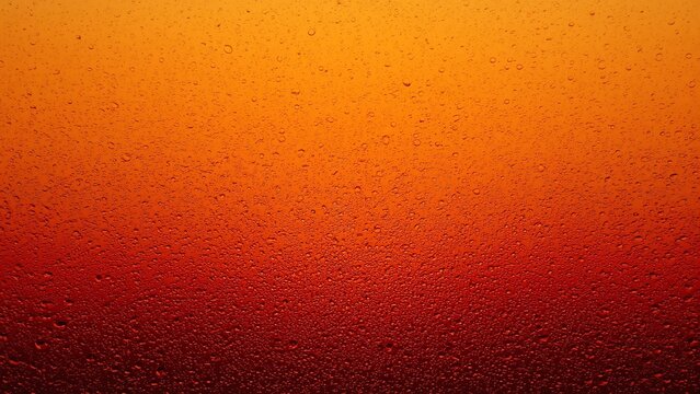 A vibrant and colorful abstract background with a gradient of orange and red hues