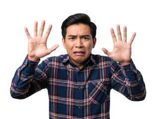 Fototapeta premium Scared young Asian man in a plaid shirt holding hands up in defense against white background, isolated. isolated on transparent background