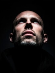 Man looking at light in darkness. Illustration of hope and faith.