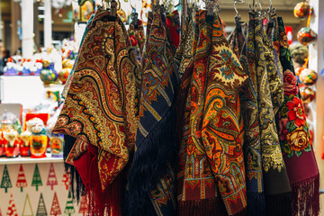 Russian colorful traditional scarfs for sale in a gift shop